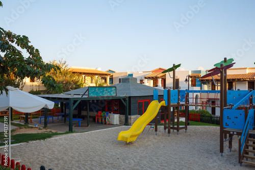 Wallpaper Mural Playground with slide and swing at dawn Torontodigital.ca