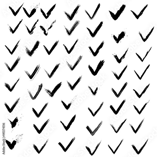 Set of hand drawn paint ink check marks. Grunge black and white elements. Abstract brush drawing. Vector illustration.