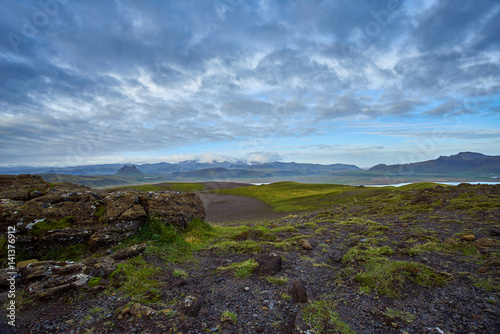 Cloudy day at Dyrholaey, Iceland with the blue sky and moving cloud © hafizanwar