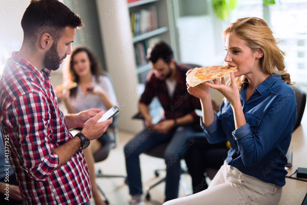 Corporate lunch break at work in company offices