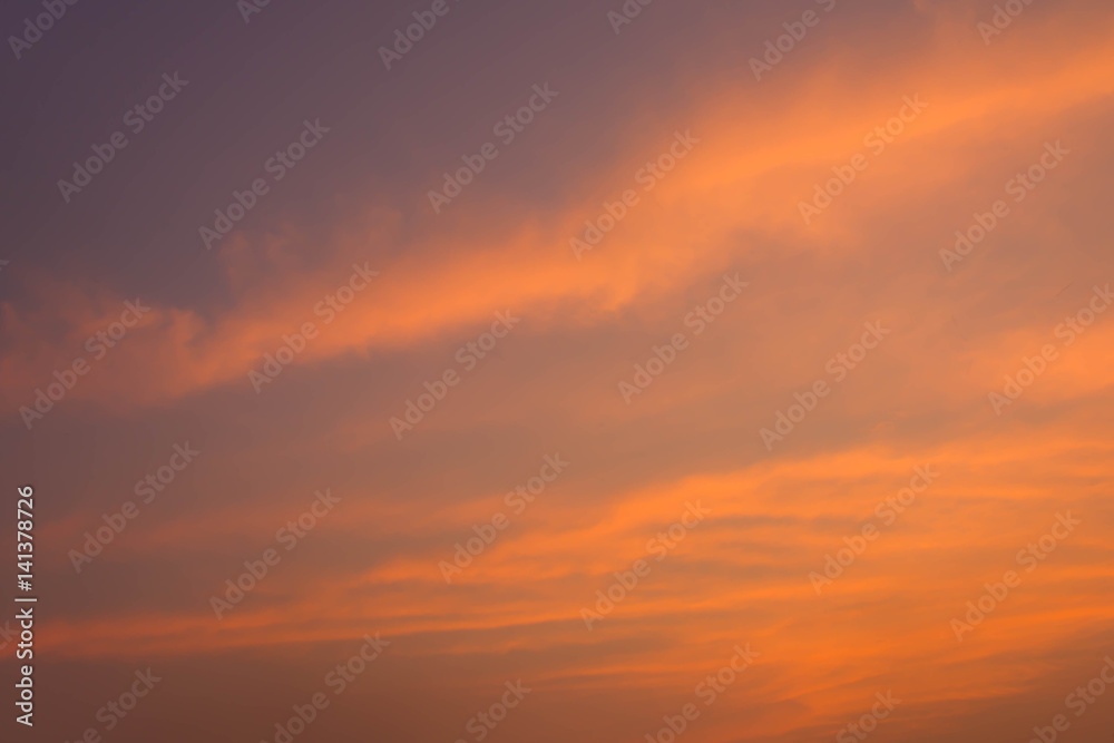 Fantastic dreamy sunrise, bright blue skies and colorful clouds,