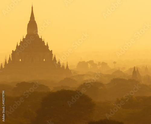 Outlines of an ancient Buddhist temples in Bagan, Myanmar in the morning mist