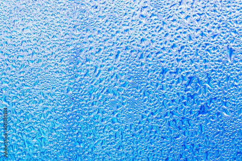 Blue water drops background.