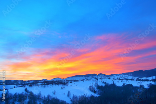 Majestic sunset in the mountains landscape. Dramatic sky. Carpathian  Romania  Europe.