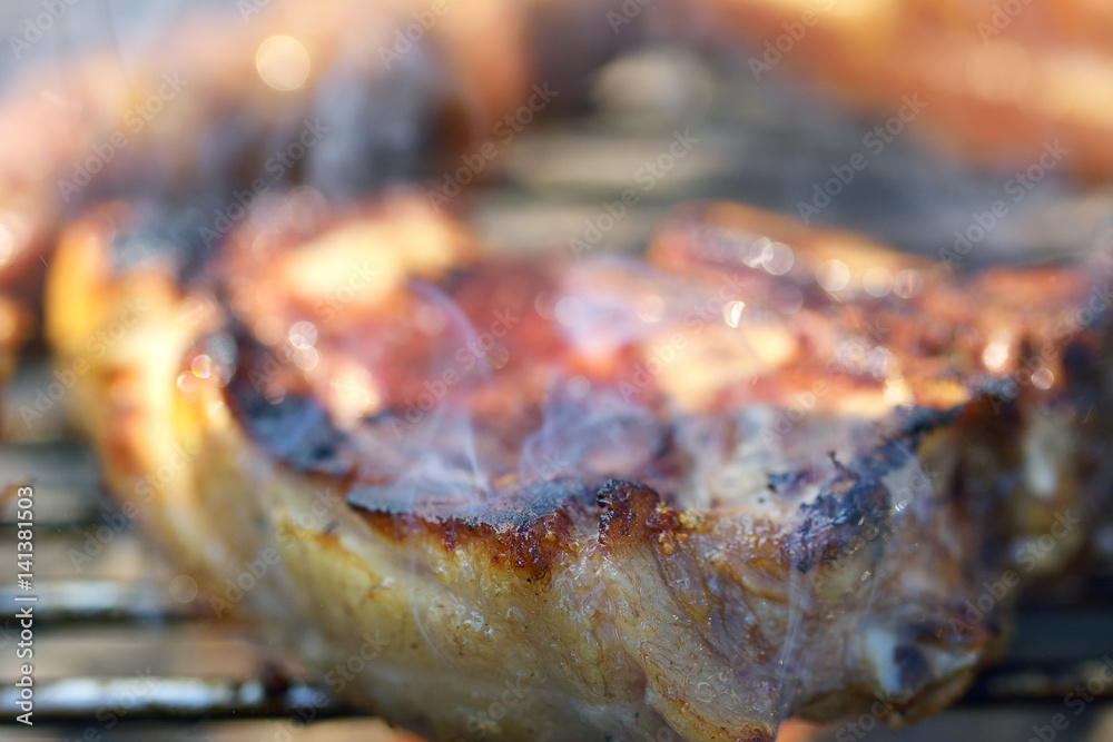Grilled pork steak on the grill Grilled pork steak on the grill