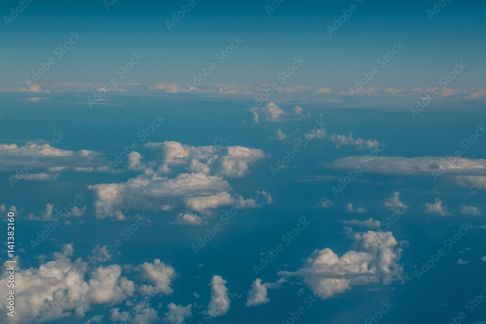 Fototapeta premium White soft clouds on idyllic blue sky