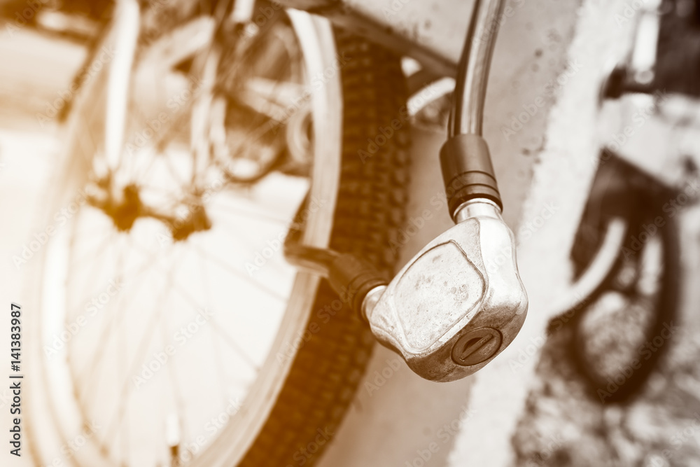 Fototapeta premium Security lock blocking the bicycle wheel.