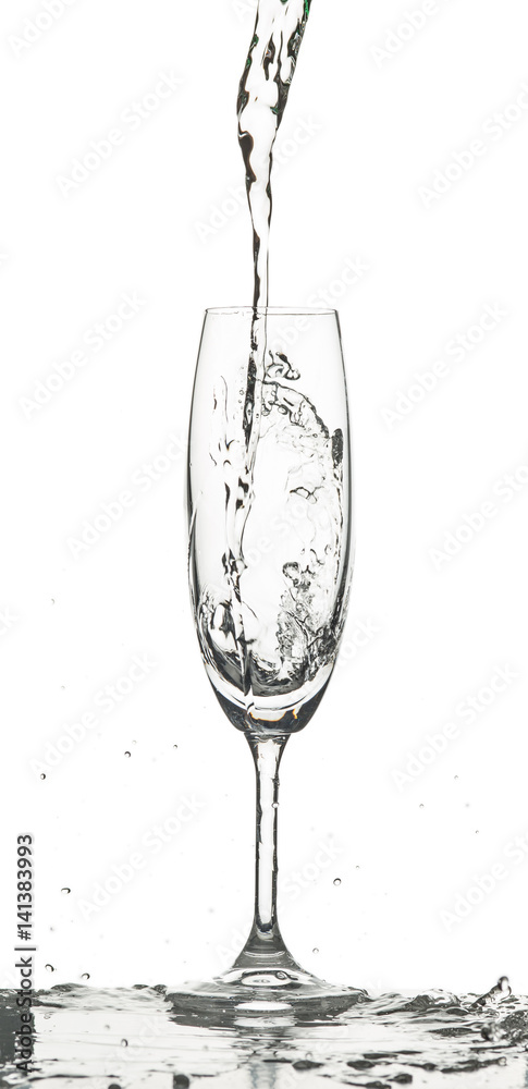 The water splashing to glass on white background The water splashing to glass on white background