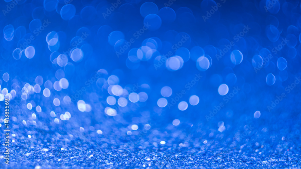Abstract background bokeh in blue tone.
