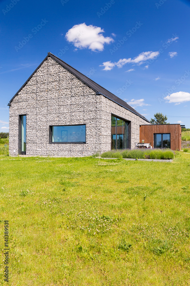 Rustic stone house on the meadow Rustic stone house on the meadow
