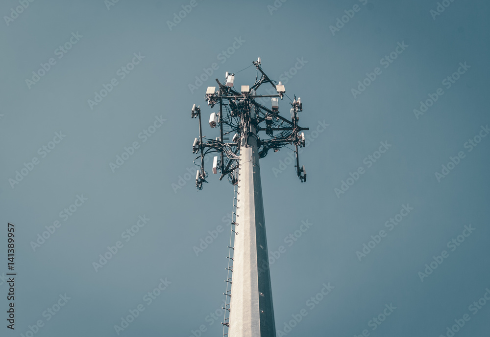 Isolated cellular radio antenna. Radio antenna with clear sky background.  Industrial energy power design. Minimal design and detail. Broadcast tower.  Steel beam tower. Stock Photo | Adobe Stock