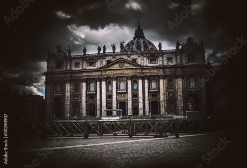 Dark dramatic view of St Peters basilica, Vatican photo