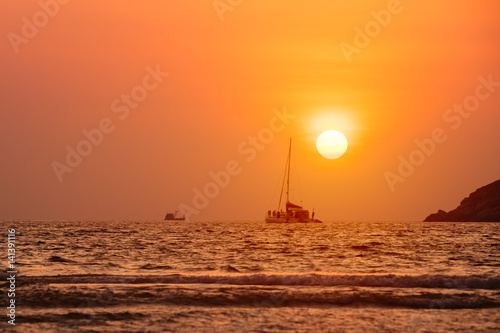 Sunset at Nai Harn beach. Phuket  Thailand.