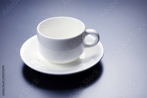 Fototapeta Naklejka Na Ścianę i Meble -  empty white Cup with saucer for coffee