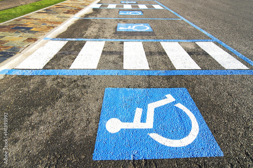 disabled handicap parking  space reserved for handicapped photo