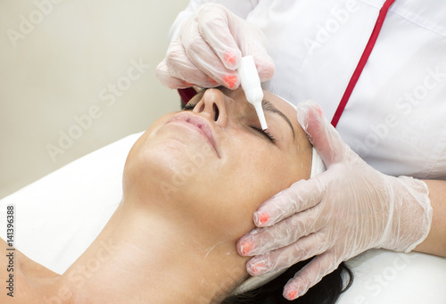 Process of massage and facials in beauty salon © lester120