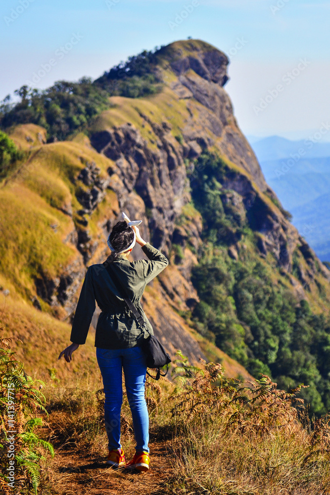 Women tourists to mountain peaks Women tourists to mountain peaks
