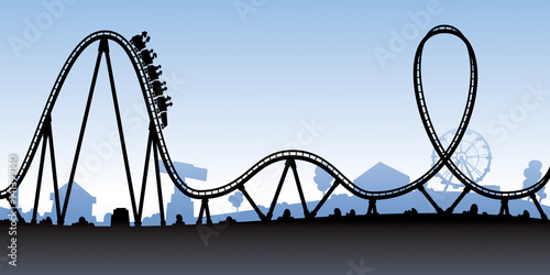 A silhouette of a cartoon roller coaster about to go down a large hill.