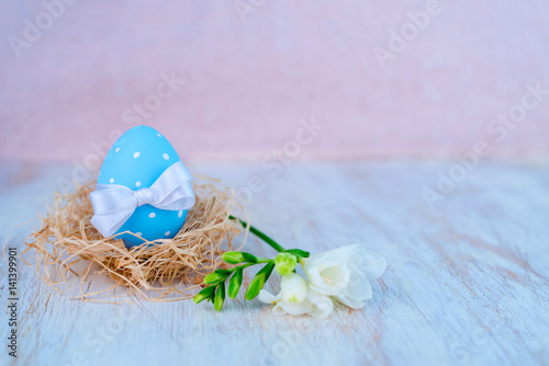 Easter eggs over white wooden vintage table - copy space