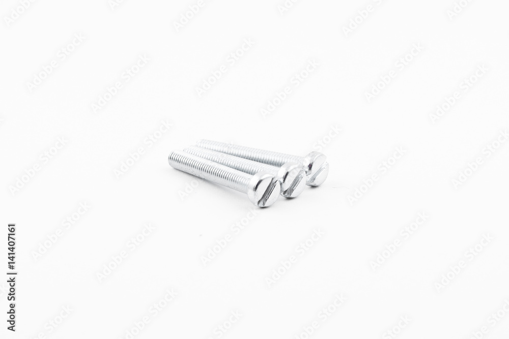 Closeup silver zinc coated screw isolate on white background. The threaded screws to M4. Isolated fasteners. Connecting material on white background. Silver threads on bolts. Closeup silver zinc coated screw isolate on white background. The threaded screws to M4. Isolated fasteners. Connecting material on white background. Silver threads on bolts.
