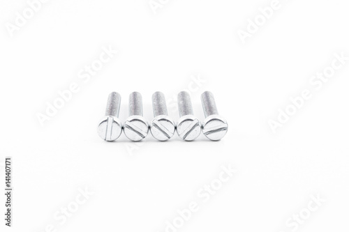 Closeup silver zinc coated screw isolate on white background. The threaded screws to M4. Isolated fasteners. Connecting material on white background. Silver threads on bolts.