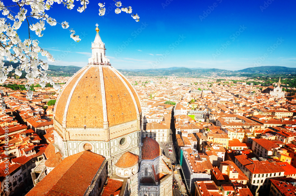 old town roofs with cathedral church Santa Maria del Fiore at spring day, Florence, Italy