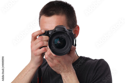 Professional photographer taking photo with digital camera