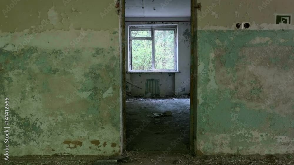 Window and doorway in the neglected house. Smooth and slow dolly shot Window and doorway in the neglected house. Smooth and slow dolly shot