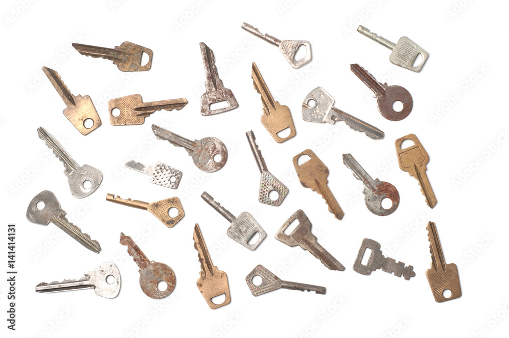Old vintage keys of locks on a white background