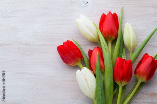 Red tulips, spring flowers and Easter decoration.