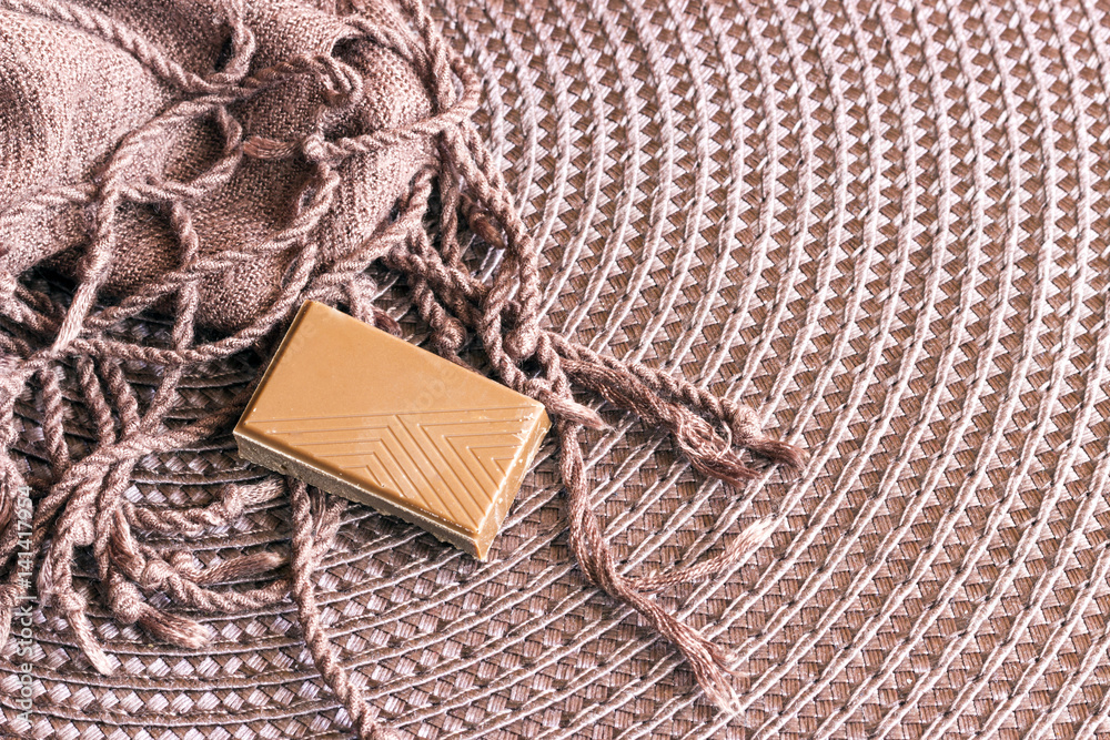 Brown scarf on brown background Brown scarf on brown background