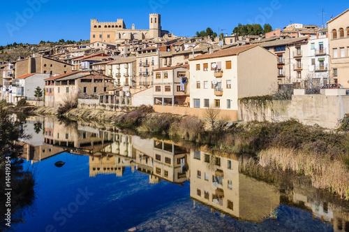 Reflection in the river in Valderrobres, Spain photo