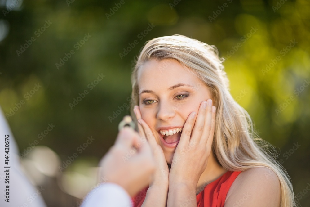 Naklejka premium Woman surprised after seeing the ring