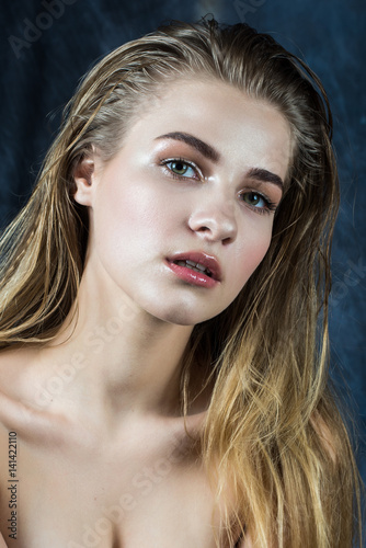 Portrait of a young attractive woman. Fashion and professional Makeup