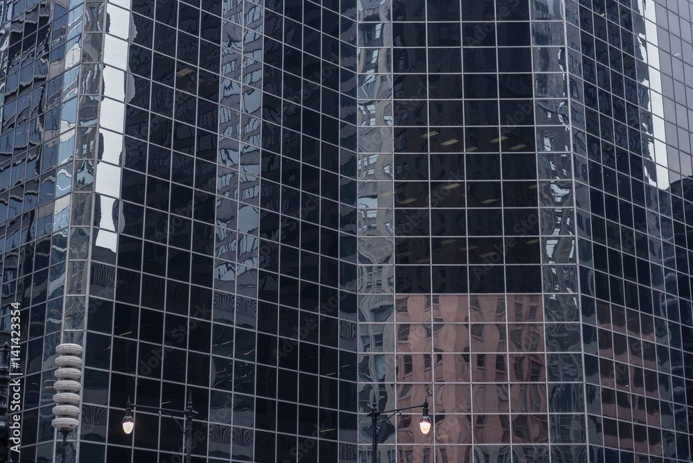 Imposing multi-storey buildings mirroring other buildings Imposing multi-storey buildings mirroring other buildings