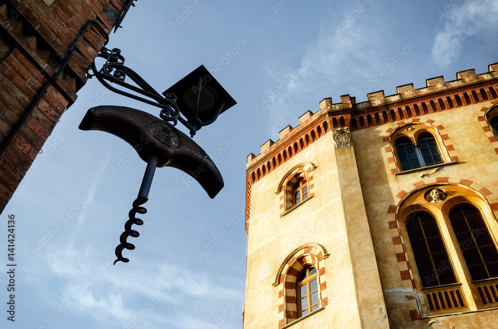 Φωτογραφία The castle of Barolo (Piedmont, Italy) with a giant wine corkscrew hanging from