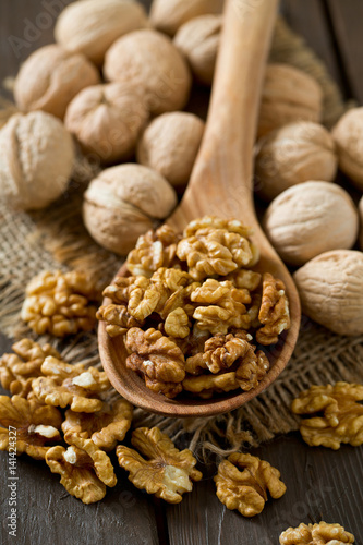 walnuts on wooden surface