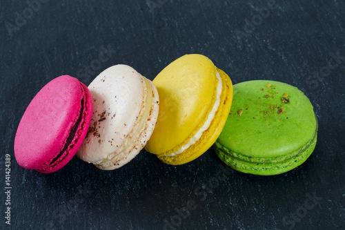 macaroons on black surface photo