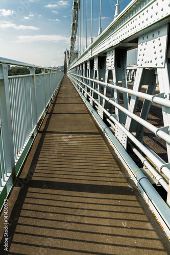 Footpath part of deck of the Menai Suspension Bridge over between Anglesey and mainland Wales