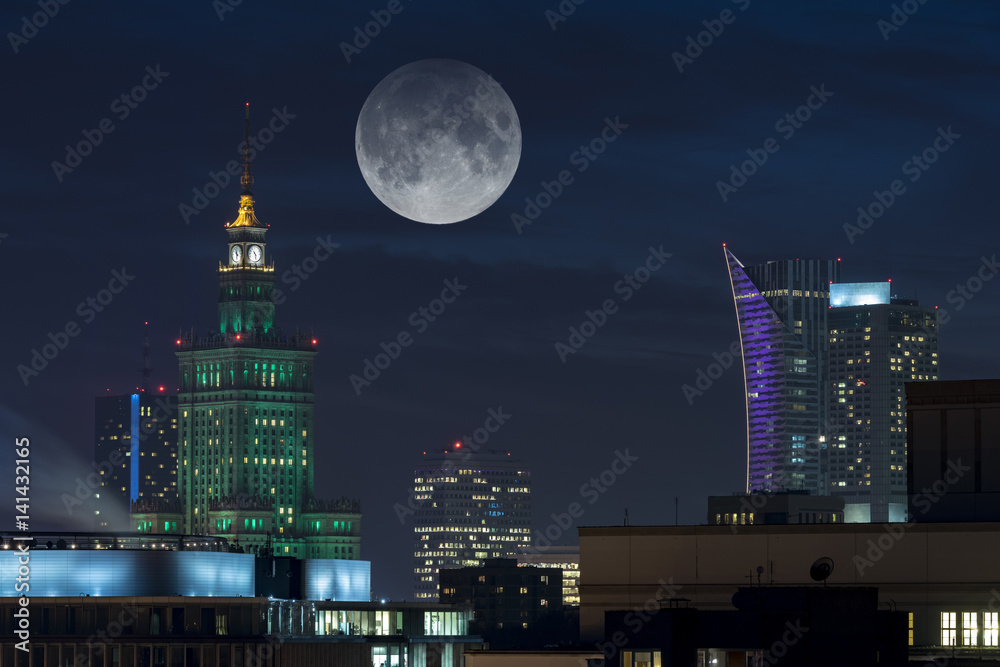 Moon over Warsaw city