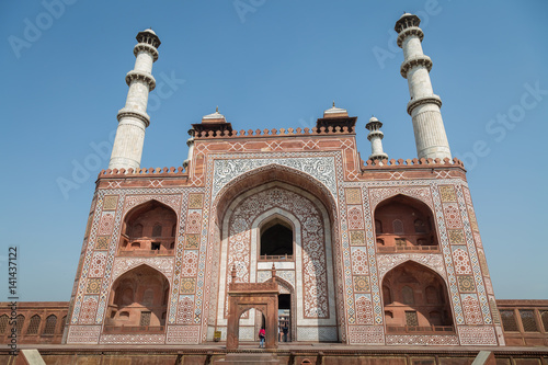 Mughal emperor Akbar tombstone external entrance at Sikandra, Agra, Uttar Pradesh India built to replicate the Buland Darwaza. A classic example of Mughal Indian architecture. photo