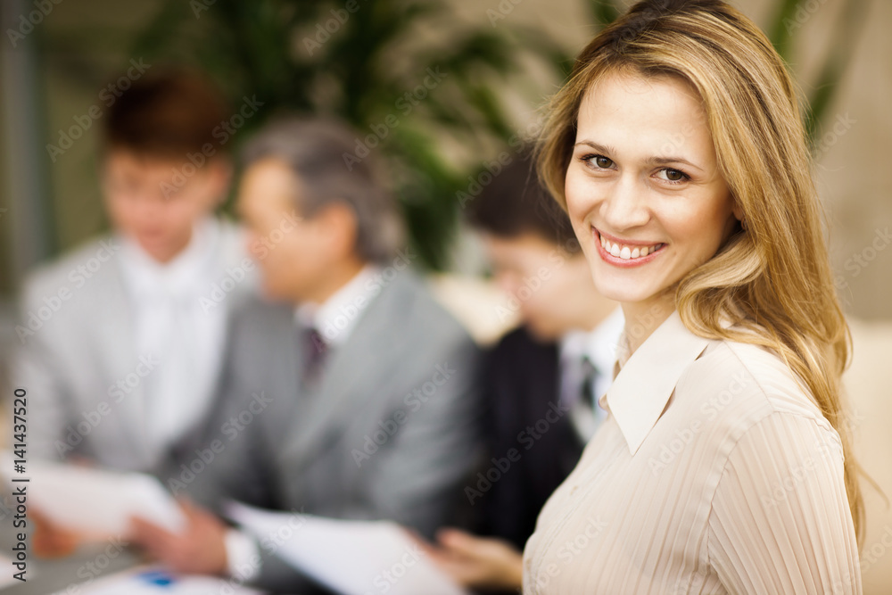 Portrait of young confident business woman smiling Portrait of young confident business woman smiling