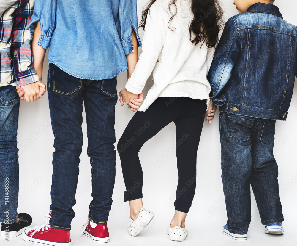 Group of Kids Holding Hands Behind Rear View on White Blackground Group of Kids Holding Hands Behind Rear View on White Blackground