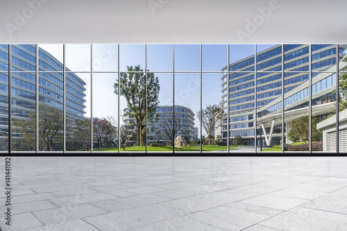 The modern office buildings from glass window