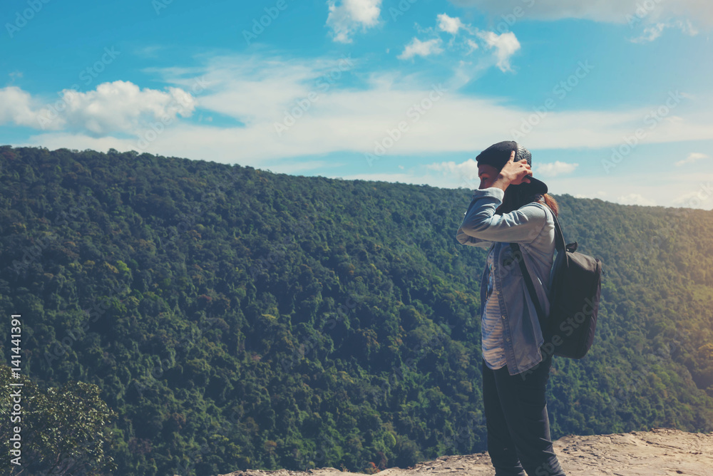 woman hiking enjoy the beautiful view at mountain for sun light woman hiking enjoy the beautiful view at mountain for sun light
