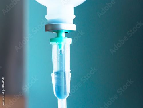saline IV drip for patient and Infusion pump in hospital