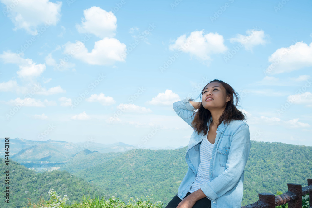 woman happy at mountain view  for sun light