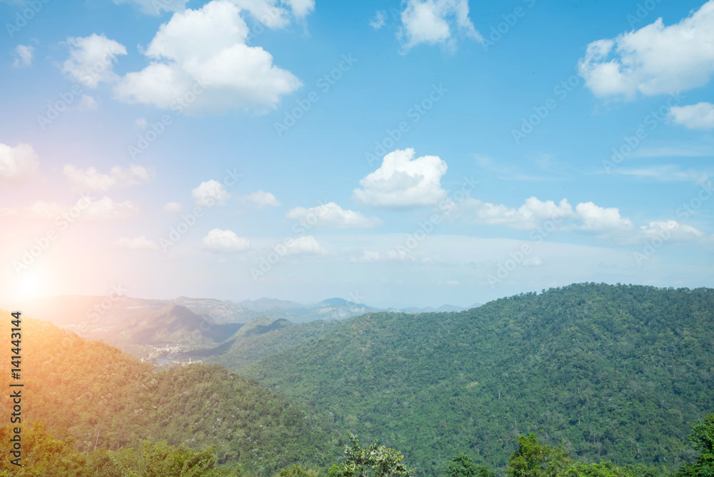 mountains landscape under sky with clouds and sun light mountains landscape under sky with clouds and sun light