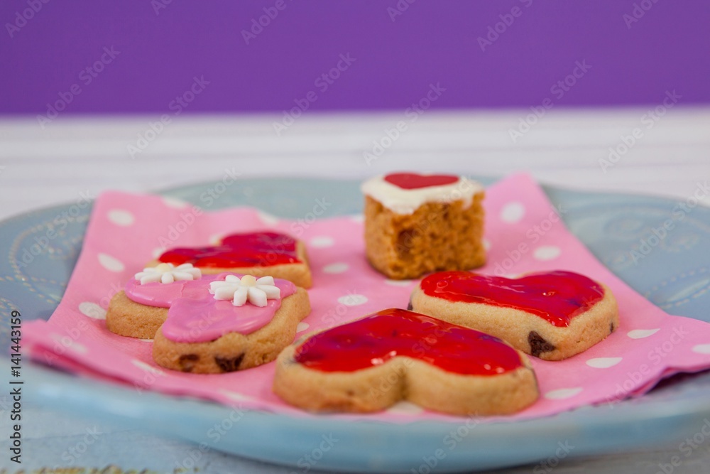 Heart shape gingerbread cookies on plate Heart shape gingerbread cookies on plate