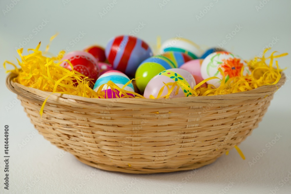 Painted easter eggs in basket Painted easter eggs in basket